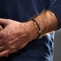 Браслет из плетеной кожи с серебряной вставкой  Браслет на руку,Серебро,Натуральная кожа,с вставкой Серебряная вставка Белая цвета,с замком Карабинный,РОССИЯ