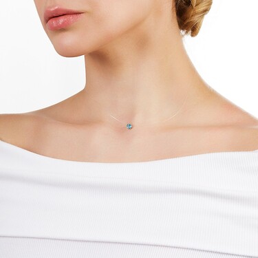 Женское колье-невидимка на леске с серебряной подвеской с голубым фианитом, родий