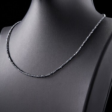 Женские бусы из темно-серого терагерца и ювелирного сплава, родирование