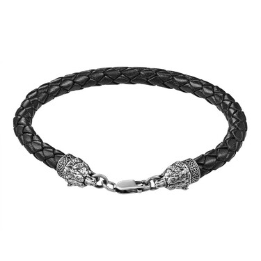 Кожаный браслет с серебряными вставками в виде голов волка,чернение