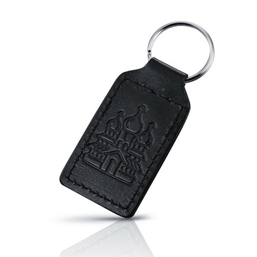 Серебряный брелок-оберег из натуральной кожи 